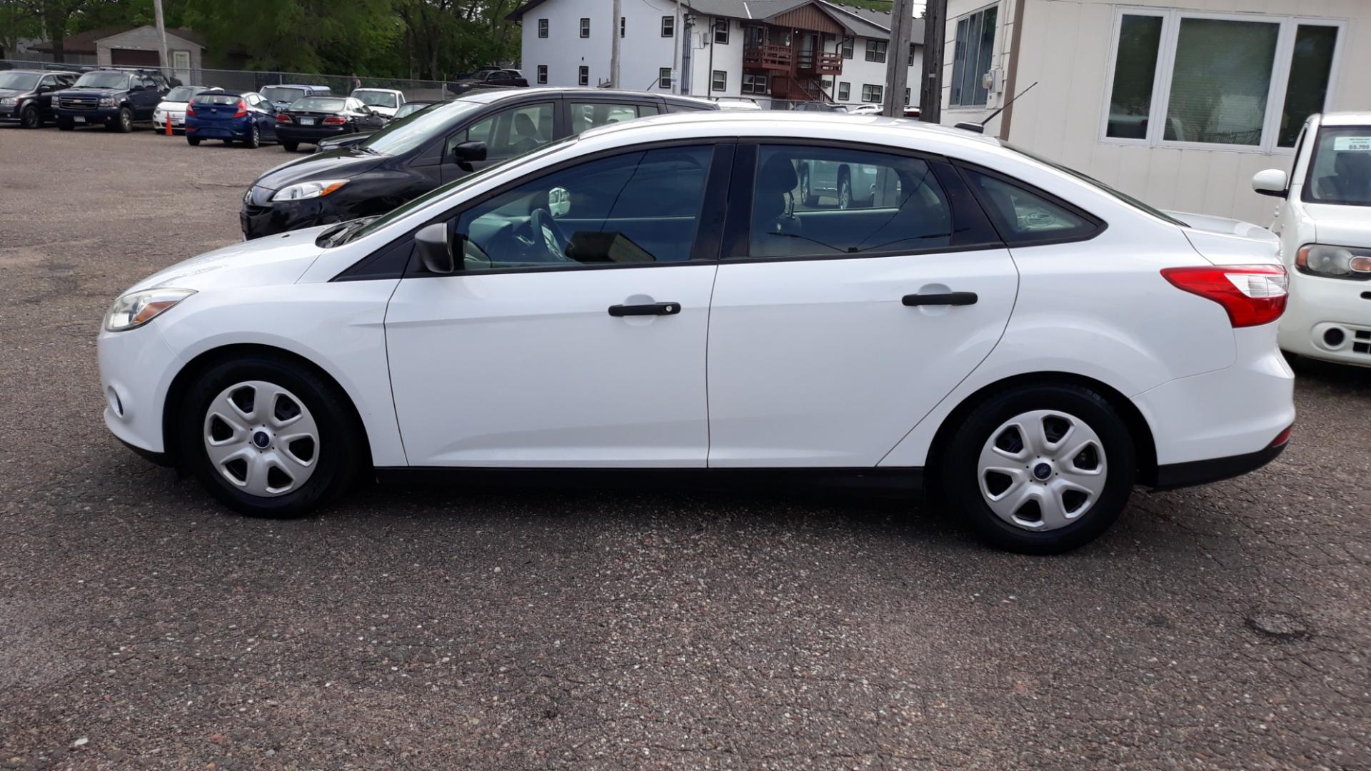 2014 Ford Focus S Sedan (1FADP3E21EL) with an 2.0L L4 DOHC 16V engine, AUTO transmission, located at 434 West Main Street, Anoka, MN, 55303, (763) 576-9696, 45.201759, -93.396706 - 2014 FORD FOCUS S, ONE OWNER, SUPER CLEAN, WITH ONLY 66,242 MILES - Photo#7